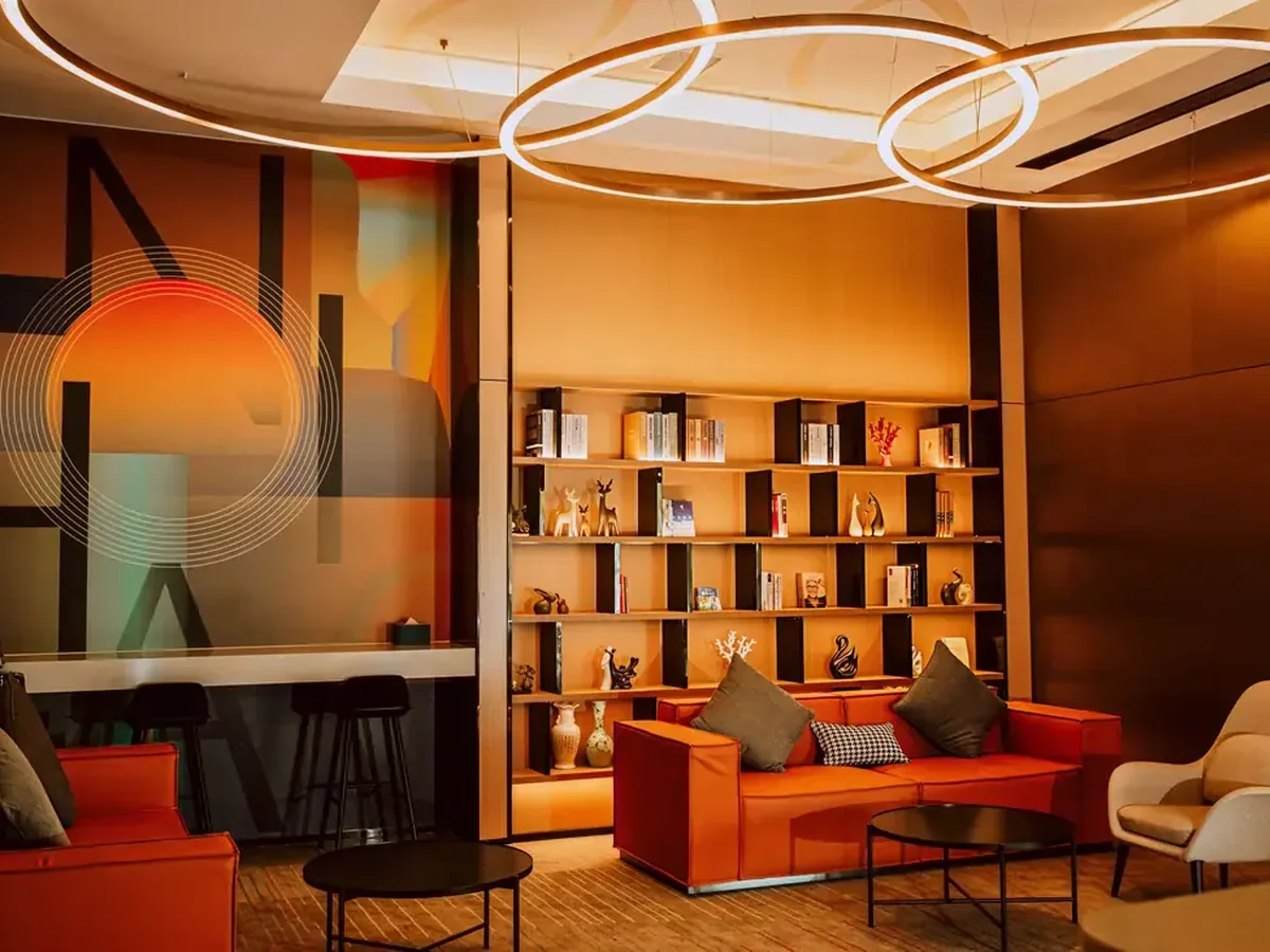 Commercial reception millwork with a raised transaction top and locking storage below
