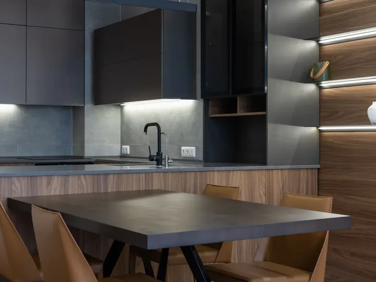 Felt-lined flatware drawer and plate storage inside a built-in dining room buffet