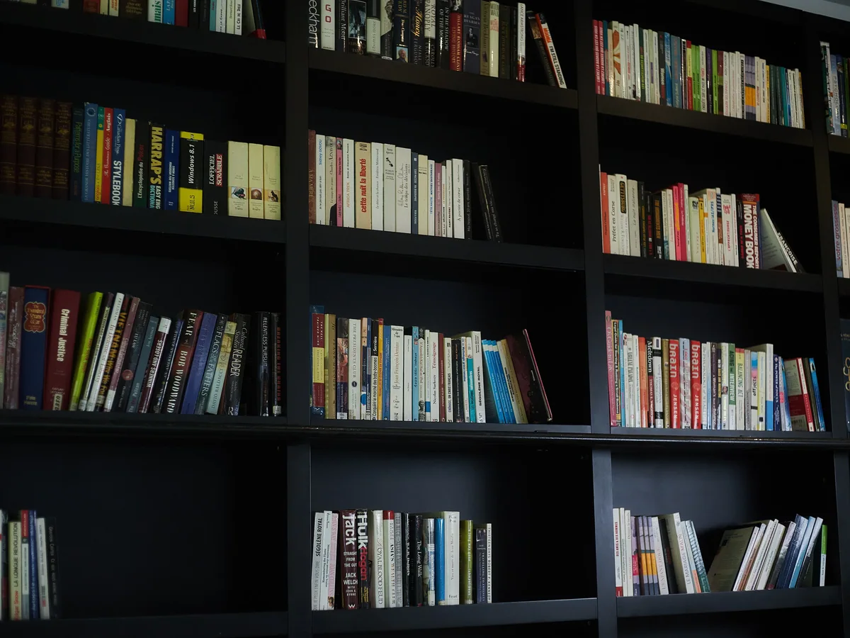 Adjustable shelving and a locking file drawer in a custom home office built-in