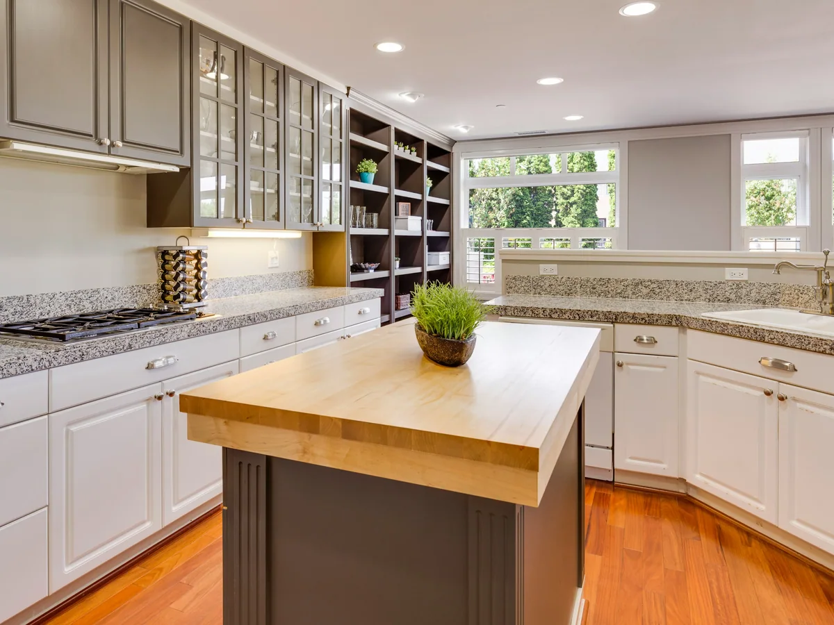 Furniture-grade end panel and corbel detail on a custom-built kitchen island